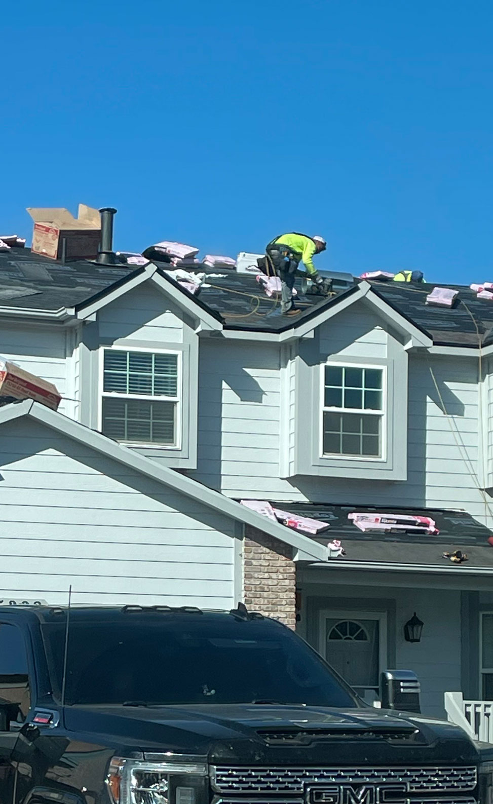 Man Working On Roof